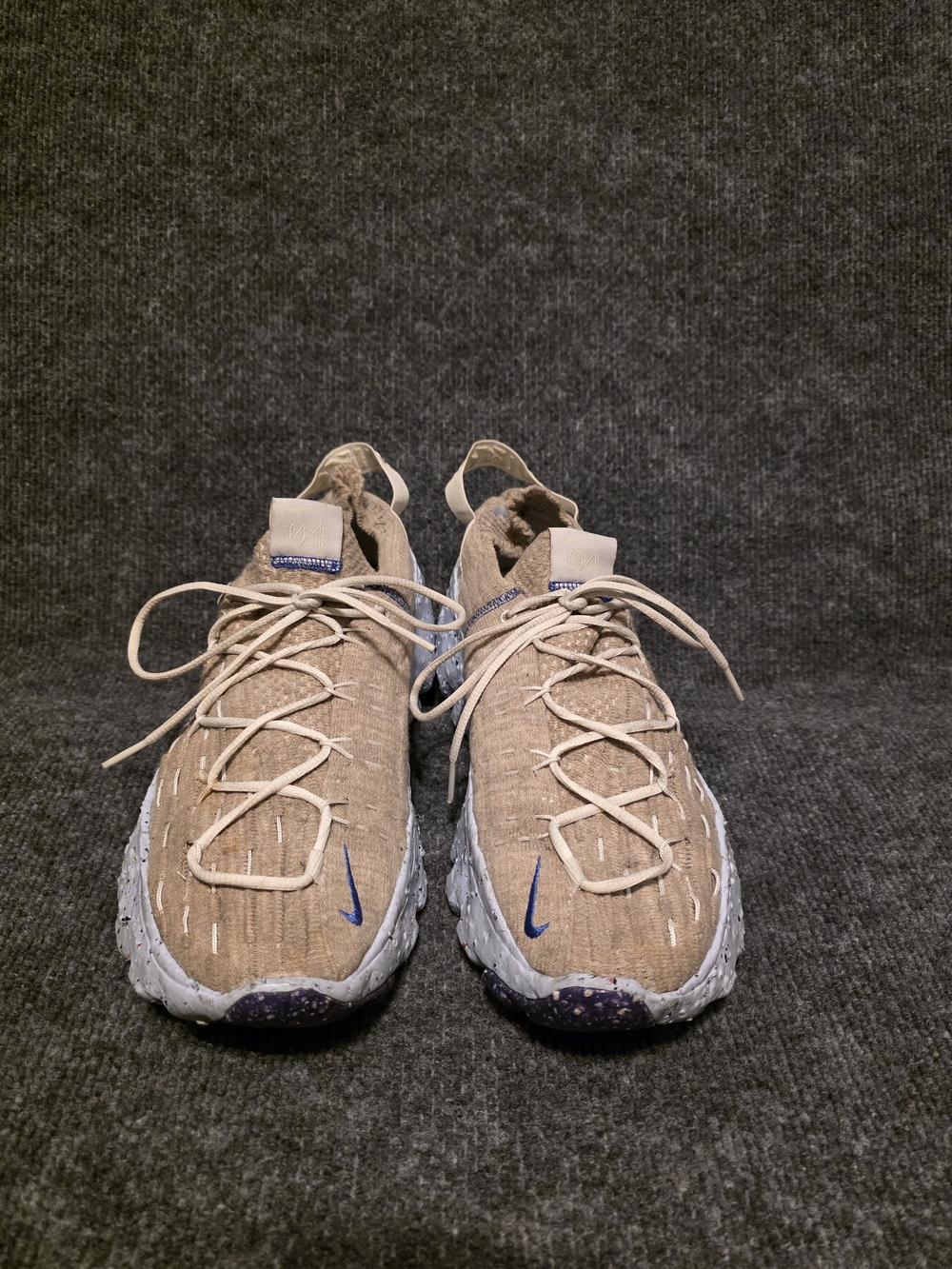Nike Men’s Beige Athletic Sneakers with Blue Swoosh